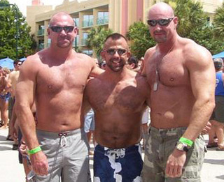 three shirtless bodybuilders