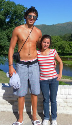 very tall man shirtless girlfriend vacation