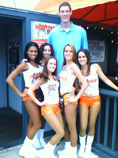 tall ugly guy with hooters girls 