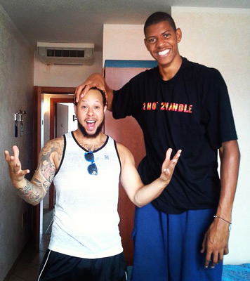 tall black basketball player laughing friend