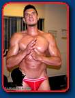 bodybuilder dominick gym posing